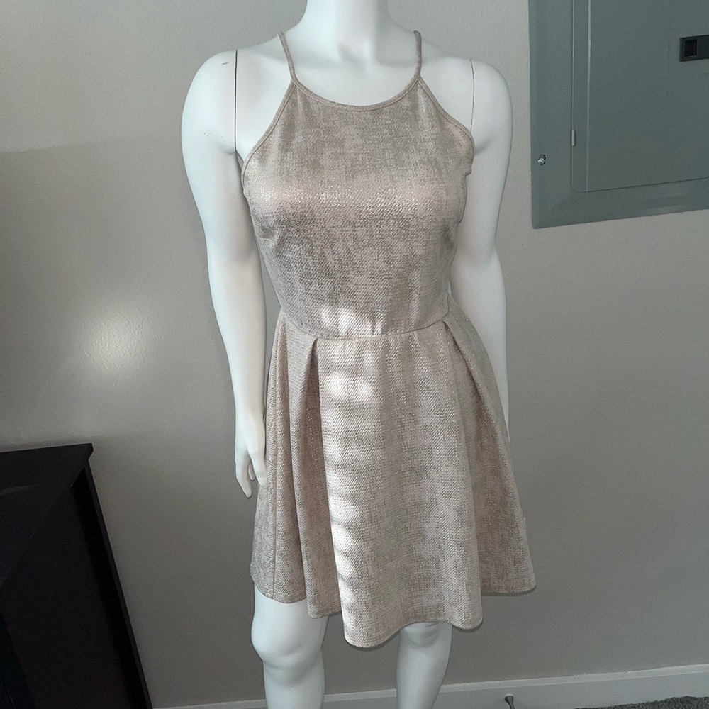 Pretty pretty dress!! Worn once for New Years. Gold size large from Francesca’s